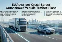 EU Advances Cross-Border Autonomous Vehicle Testbed Plans EU advances cross-border autonomous vehicle testbed plans — AV Test Bed truck and car drive on a highway with city skyline in the distance.
