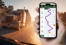 The Evolution of Truck Navigation: From Hardware Devices to App-Based Solutions Truck driving on a sunset-lit highway while a person holds a smartphone showing a winding GPS route on the map.